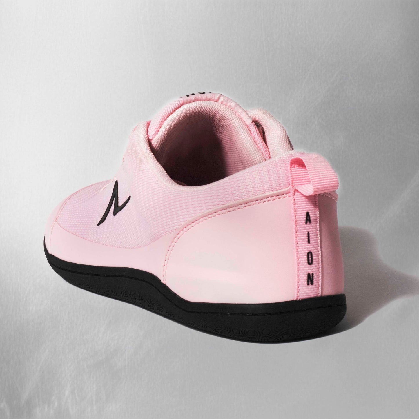 Supportive heel cup side cushioning and cushiony tongue. Comfortable zero drop training shoe built for women that squat. Foot Strength is guaranteed!