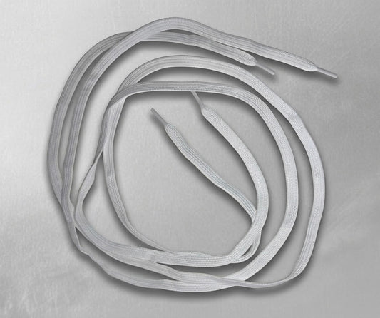 Gray elastic bands arranged in a circular pattern on a gray background